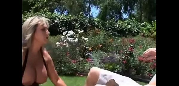  Big titted MILF fucked by young guy in garden